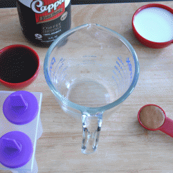 measuring cups and a bottle of Cappio Cold Brew Coffee